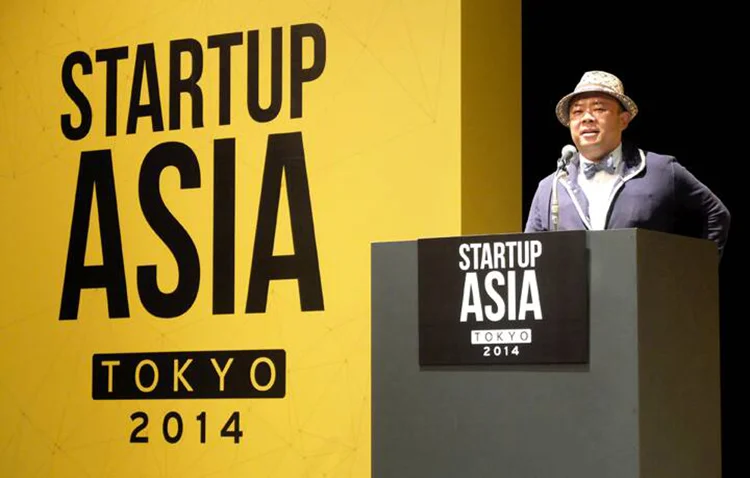 Ông Taizo Son tại sự kiện Startup Asia Tokyo 2014. Ảnh: Tech in Asia.